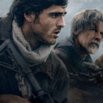 Two armed men and a dog in a gloomy landscape.